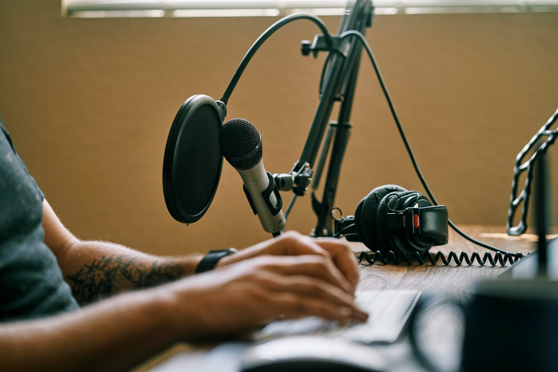 person with podcast setup