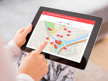 Person looking for places to stay on digital tablet app